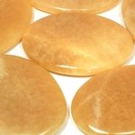 Orange Calcite Palm Stone, Extra Grade ~70x50mm