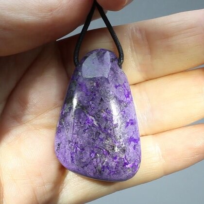 Sugilite Drilled Tumblestone with Cord  ~41x27mm